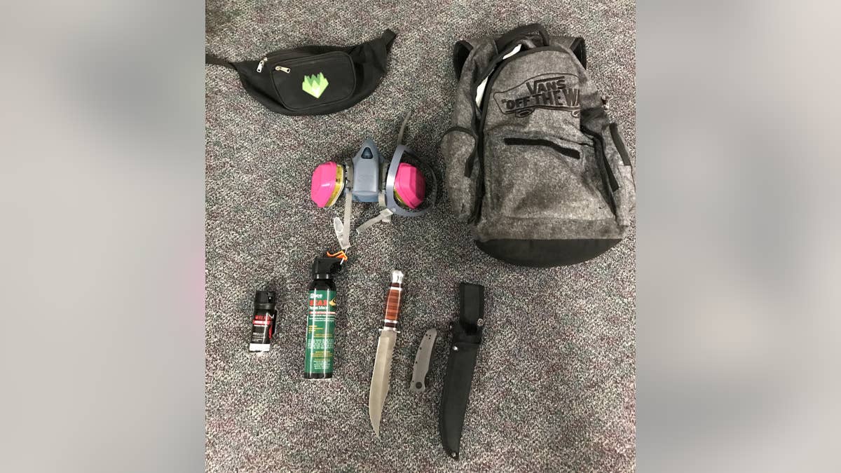 The Portland Police Bureau said those arrested were armed with knives and "OC" spray.