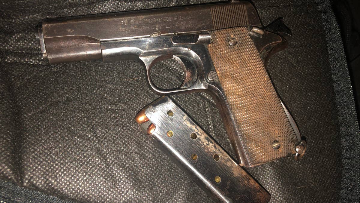 A handgun was found inside a car labeled with a red cross to signal it was working as an amateur medic. (Portland Police Bureau)