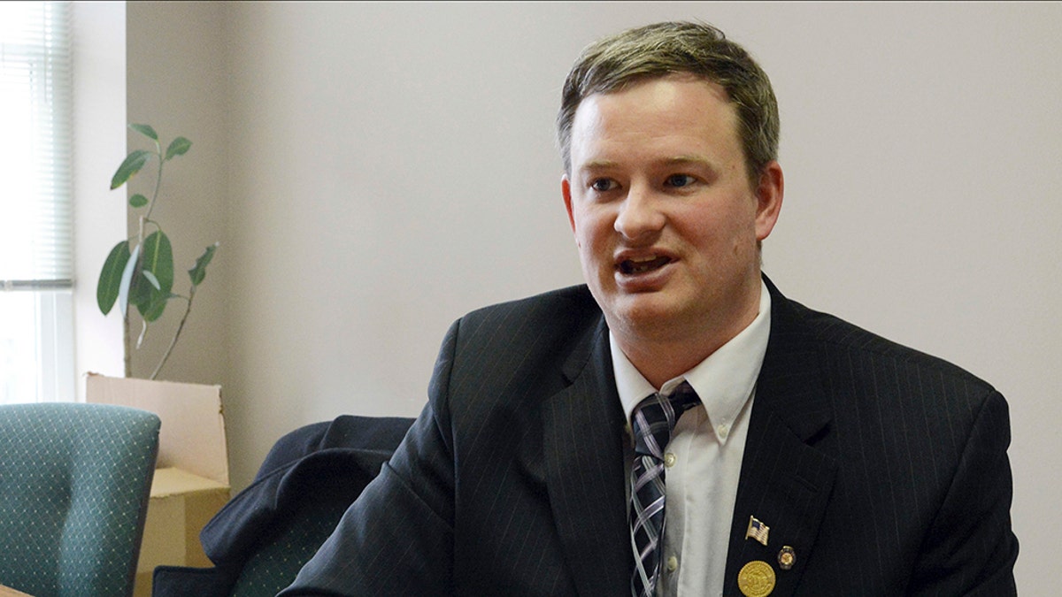 FILE - In this Feb. 23, 2014, file photo Jason Ravnsborg speaks in Sioux Falls, S.D. (AP Photo/Dirk Lammers, File)