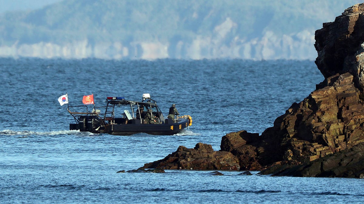 A South Korean marine boat patrols near Yeonpyeong island, South Korea, on Sunday. (Baek Seung-ryul/Yonhap via AP)