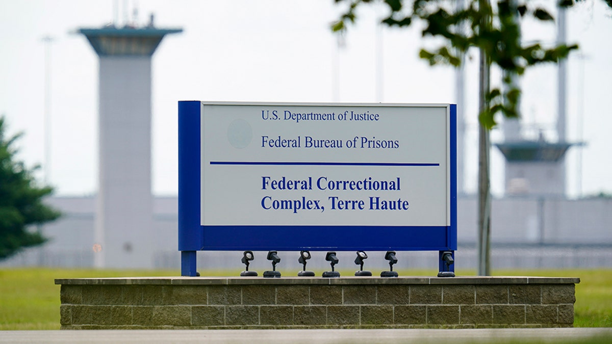 FILE - In this Aug. 28, 2020, file photo shows the federal prison complex in Terre Haute, Ind. A wave of federal executions by the Trump administration after a 17-year hiatus are set to resume. If it goes ahead as scheduled Tuesday, Sept. 22, 2020, William Emmett LeCroy would be the sixth federal death-row inmate executed this year at the U.S. prison in Terre Haute, Indiana. Another is scheduled Thursday. (AP Photo/Michael Conroy, File)