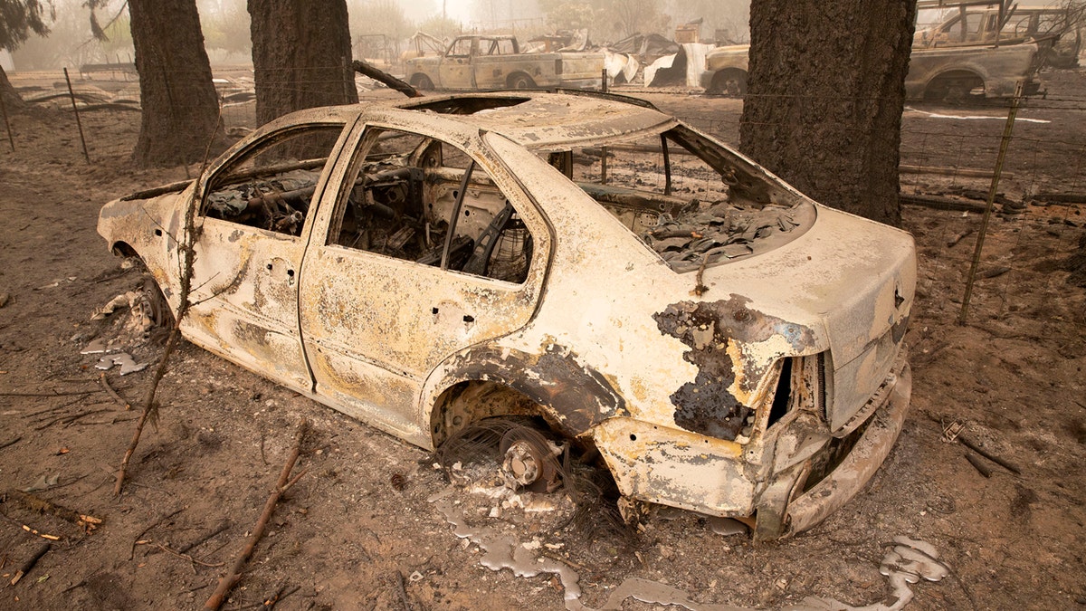 Flames from the Beachie Creek Fire melted the aluminum rims on a car near the destroyed Oregon Department of Forestry, North Cascade District Office in Lyons, Ore., Sunday, Sept. 13, 2020.