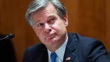 FBI Director Christopher Wray, testifies during a Senate Homeland Security and Governmental Affairs Committee hearing on "Threats to the Homeland" Thursday, Sept. 24, 2020 on Capitol Hill in Washington. (Tom Williams/Pool via AP)