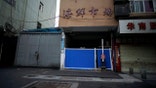 File photo - A blocked entrance to Huanan seafood market, where the coronavirus that can cause COVID-19 is believed to have first surfaced, is seen in Wuhan, Hubei province, China March 30, 2020. Picture taken March 30, 2020.