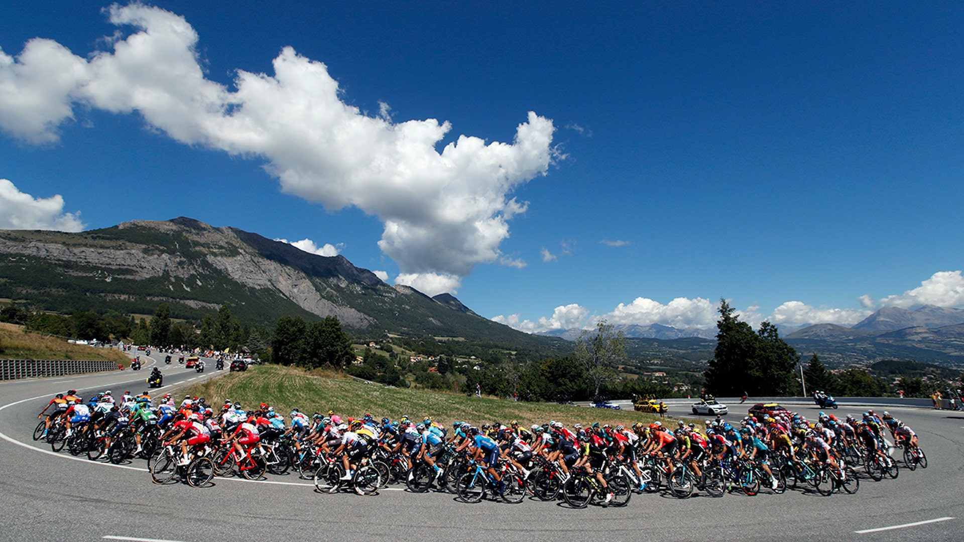 The pack rides during the fifth stage of the Tour de France cycling race with start in Gap and finish in Privas, France, Sept. 2, 2020. 