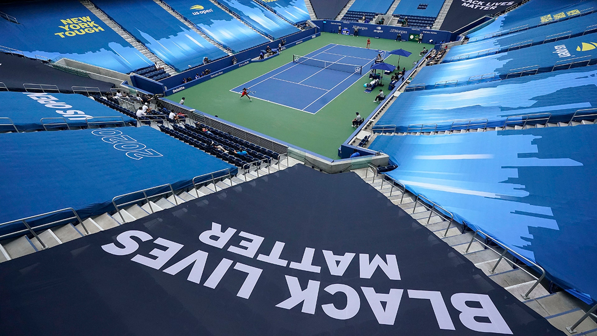 Coco Gauff, of the United States, returns a shot to Anastasija Sevastova, of Latvia, during their first-round US Open match in New York, Aug. 31, 2020. 