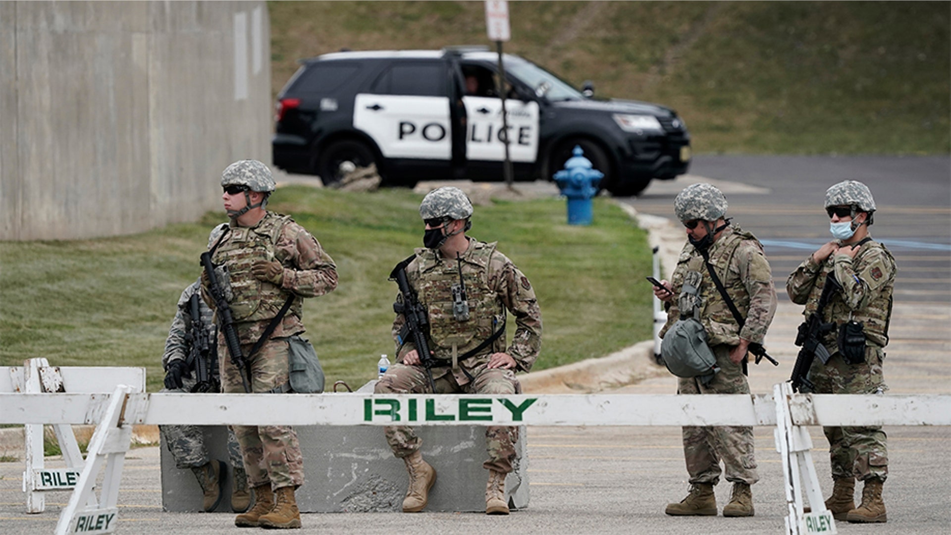 Members of the National Guard secure Mary D. Bradford High School.