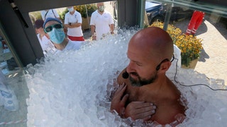 Austrian man lasts more than 2.5 hours in box of ice to break own record