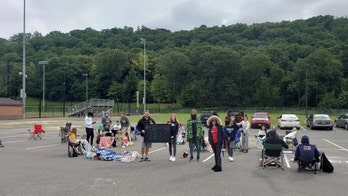 New York students set up class in school parking lot to protest budget cuts