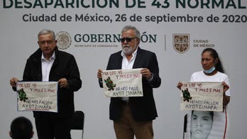 Mexican authorities issue warrants for military, police allegedly linked to disappearance of 43 students