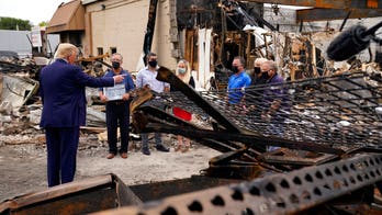 Trump visits site of riots in Kenosha, promises to help businesses rebuild