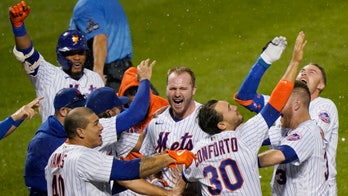 Alonso HR in 10th lifts Mets over Yanks after Seaver tribute