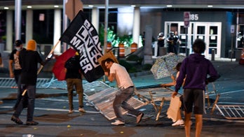 Police, protesters clash in Rochester after mayor suspends officers involved in man’s suffocation death