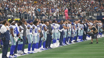 Cowboys players ponder kneeling during national anthem