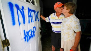 Elderly Florida couple trapped in attic rescued from flood by Jet Ski-riding firefighter