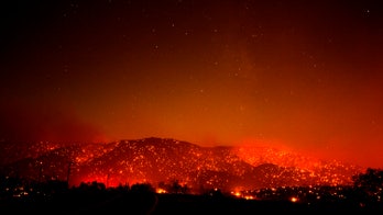 California wildfire may have sparked from tree branches hitting power equipment, utility says