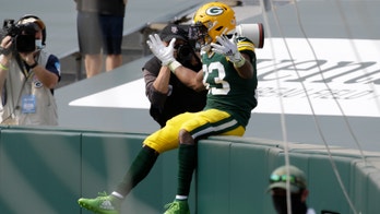Jones' big day helps Packers beat Lions 42-21 in home opener