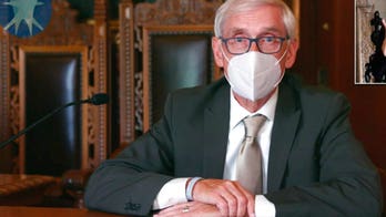 Wisconsin governor urges GOP to wear coronavirus masks as cases surge
