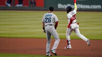 Ozuna, Braves beat Miami, clinch 3rd straight NL East title