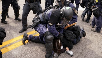 Louisville police report dozens of arrests during Breonna Taylor protests