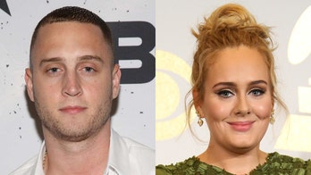 Adele gets flirty video message from Tom Hanks’ son Chet, both accused of cultural appropriation