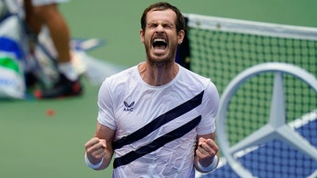 With pros in the stands, Murray saves match point at US Open