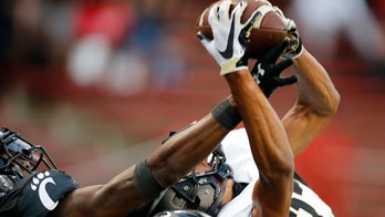 Army lineman head butts coach with helmet still on