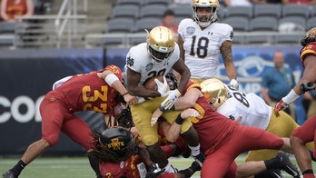 Book, No. 7 Notre Dame run by USF 52-0 to extend home streak