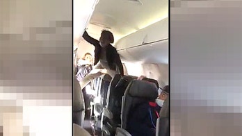 Woman's profanity-filled meltdown on flight to Detroit caught on camera
