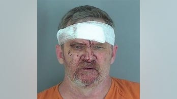 South Carolina father helps police arrest man accused of looking at teen in bathroom, reports say