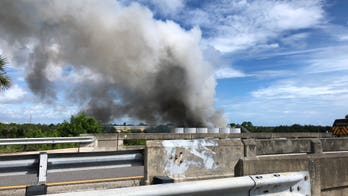 Explosion rocks Florida chemical plant sending thick black smoke billowing into the sky