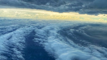 Hurricane Sally's eye, choppy seas revealed as storm lurks off Gulf Coast