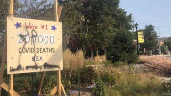 'Coronavirus Death Scoreboard' vandalized, Illinois town decides not to remove anti-Trump display