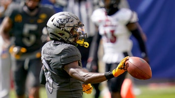 No. 21 Pitt's holds off No. 24 Louisville 23-20