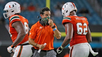 No. 17 Miami runs past No. 18 Louisville 47-34 in ACC opener