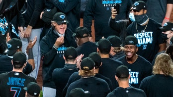 Marlins clinch 1st playoff berth since 2003, beat Yanks 4-3