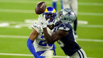 Cowboys' late drive against Rams thwarted over questionable offensive pass interference call