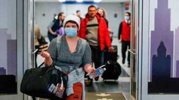 U.S. to end enhanced screening program for arriving international travelers, CDC confirms
