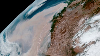 Wildfire threat simmers for West as smoke from blazes spreads into Central US