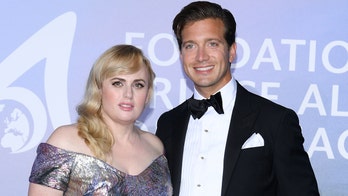 Rebel Wilson shows off weight loss in stunning dress alongside rumored new boyfriend Jacob Busch