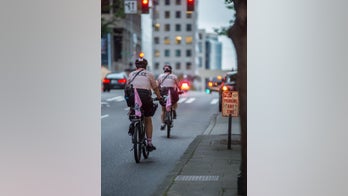 Seattle cop put on leave after appearing to roll bike over protester