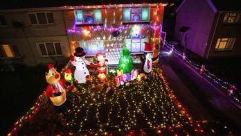 Woman's Christmas decorations up 3 months early to comfort community during 'horrible' year