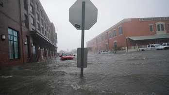 Sally spreads 'torrential' rains over Southeast, Teddy to become major hurricane on way to Bermuda