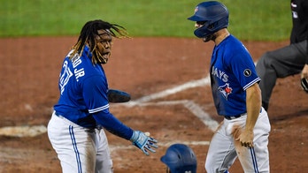 Blue Jays clinch 1st playoff spot since 2016, beat Yanks 4-1