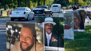Detroit park turned into photo memorial for more than 900 coronavirus victims
