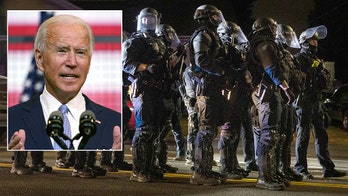 Biden clarifies position on defunding police as Republicans continue attacks