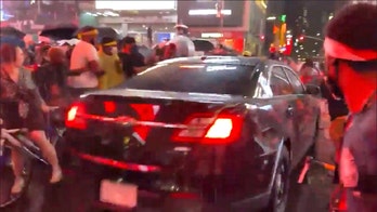 NYPD seeks car that plowed through crowd of protesters in Times Square