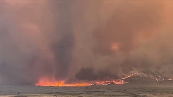 California wildfire whips up fire tornado after showing 'extreme fire behavior'