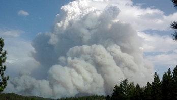 Montana wildfire skirts town, residents allowed to return home after emergency evacuation
