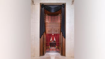 Supreme Court drapes black cloth over Ginsburg's seat: photos